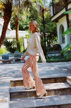 Emmi's Striped Boot Cut Pants - White/Tiger 8 Emmi's Striped Boot Cut Pants - White/Tiger -Fashion Finds Outlet ScreenShot2023 08 07at11.12.22AM 9c438732 b7fe 410b 92b3 d38d1c25006a