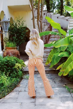 Emmi's Striped Boot Cut Pants - White/Tiger 11 Emmi's Striped Boot Cut Pants - White/Tiger -Fashion Finds Outlet ScreenShot2023 08 07at11.21.28AM